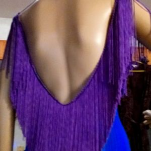 One sexy chefaun gown with backless sleevlesd fringe sz. 6